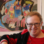 Dan Campbell with artwork