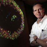 David Gamm with enlarged image of stem cell