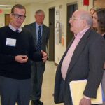 Dr. Richard Morse (with folder in hand) at a recent visit to the Waisman Center