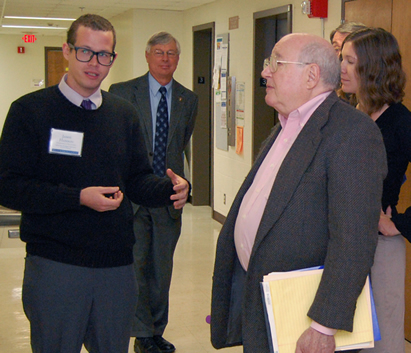 Dr. Richard Morse (with folder in hand) at a recent visit to the Waisman Center