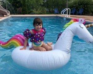 Eva on her unicorn float