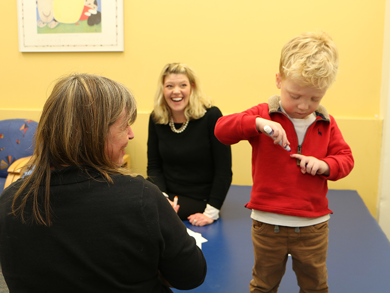 Mom with patient in Newborn Follow-up Clinic
