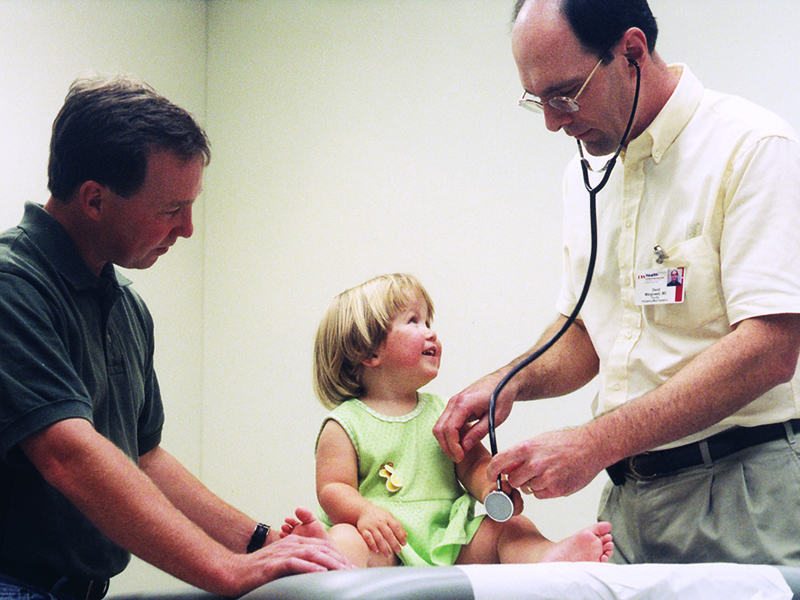 David Wargowski, MD, with patient and parent