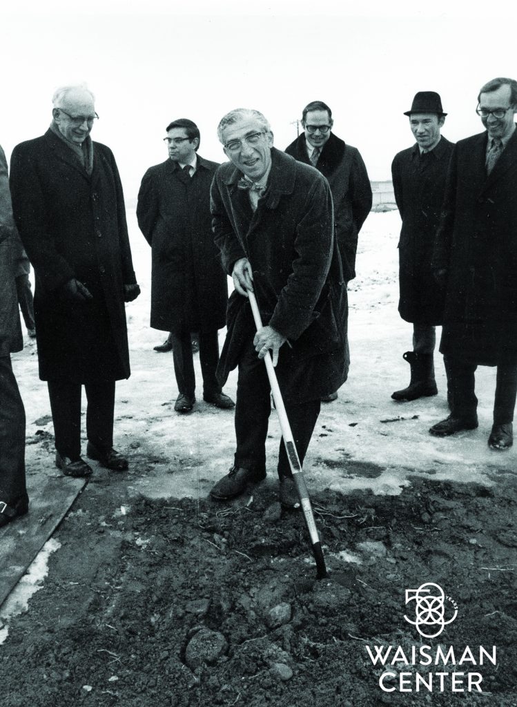 Harry Waisman turns a shovel at the 1971 groundbreaking