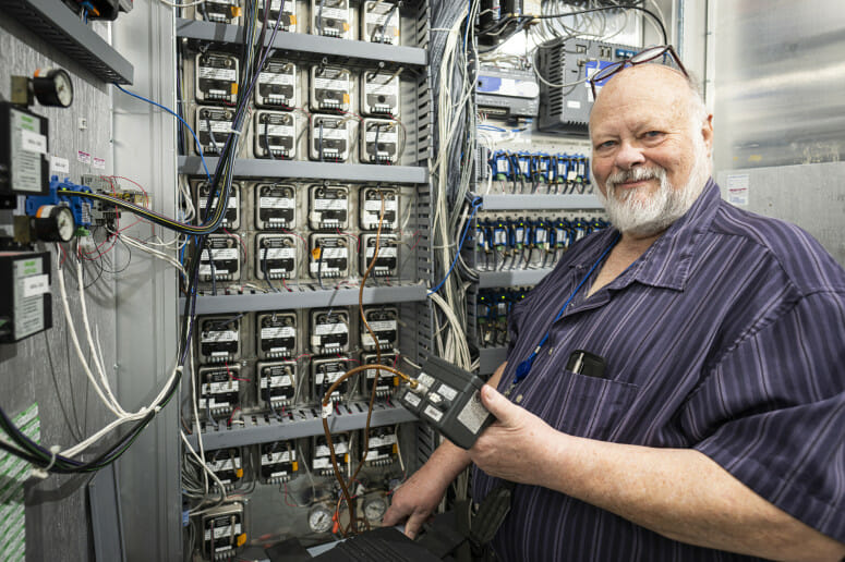 Bill Kreamer performs a maintenance check on equipment in the Waisman Biomanufacturing facility. Photo: Bryce Richter