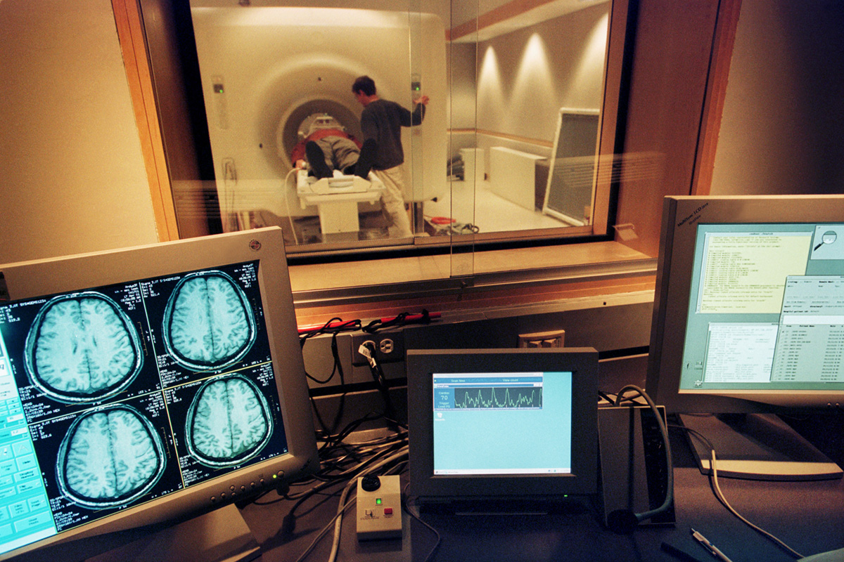 Computer monitors display imaged data in the control room of the fMRI scanner at the Keck Laboratory for Functional Brain Imaging and Behavior.