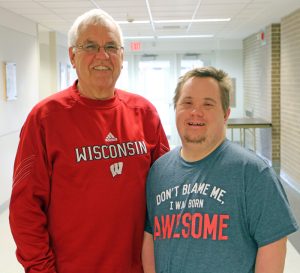 Father and son visiting the Waisman Center testing facilities.